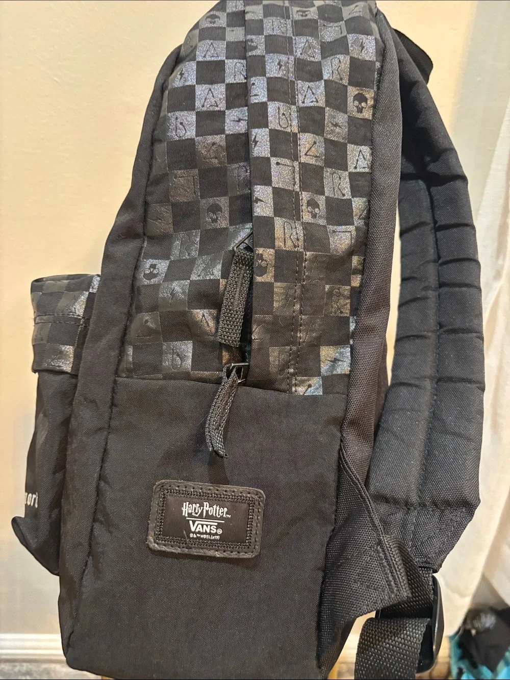 Vans Black Backpack with White Snake Crest and Checker Trim